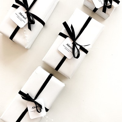 black and white gift wrapped jewelry boxes packaging