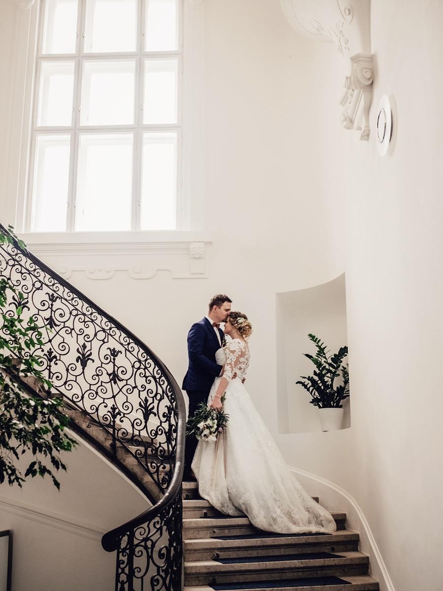 Bride and groom on stairs